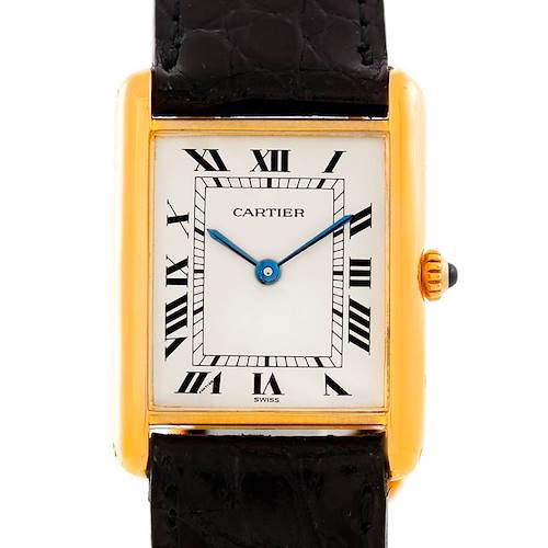 This image shows the front view of a Cartier Tank Classic Men's Yellow Gold Beige Dial Men's Yellow Gold Beige Dial watch, highlighting its rectangular dial, Roman numerals, and black strap.