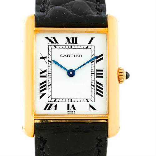 This image shows a front view of a Tank Classic model by Cartier, displaying its face, hands, and part of the strap.