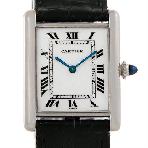 The image shows a front view of the Cartier Tank Classic Men's White Gold White Dial Men's White Gold White Dial watch, highlighting its rectangular dial, Roman numerals, and black leather strap.