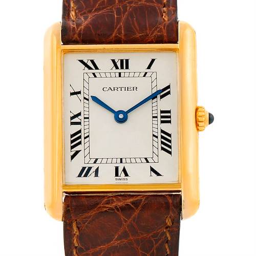 This is a top-view image showing the face, casing, and part of the strap of the Cartier Tank Classic Men's Yellow Gold Silver Dial Men's Yellow Gold Silver Dial watch.