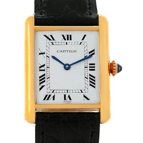 This image shows a front view of the Cartier Tank Classic Men's Yellow Gold White Dial Men's Yellow Gold White Dial watch with its rectangular dial, roman numerals, blue hands, and black strap.
