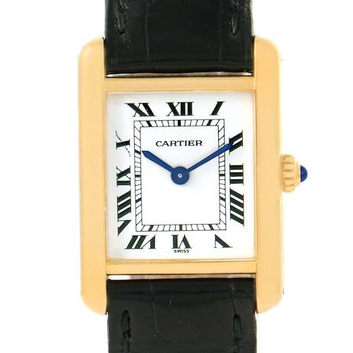 This is a front view of the Cartier Tank Classic Women's Yellow Gold White Dial Women's Yellow Gold White Dial watch, showcasing the dial, hands, and part of the strap.