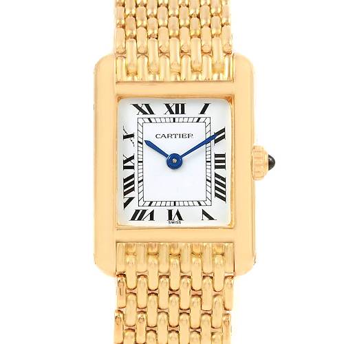 The image shows a Cartier Tank Classic Women's Yellow Gold White Dial Women's Yellow Gold White Dial watch from the front, highlighting its rectangular face, Roman numeral dial, and gold bracelet.