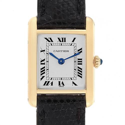 This image shows a frontal view of the Cartier Tank Classic Women's Yellow Gold White Dial Women's Yellow Gold White Dial watch, highlighting its square dial, Roman numerals, and leather strap.