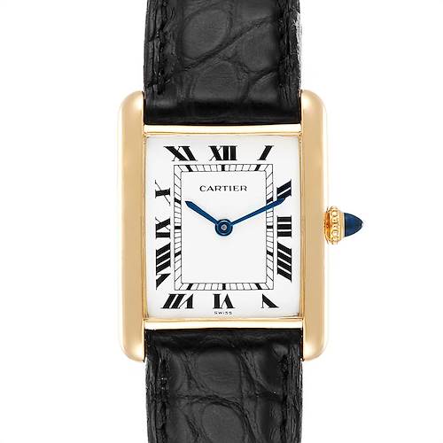 This image shows a Cartier Tank Classic Women's Yellow Gold White Dial Women's Yellow Gold White Dial watch face and black leather strap from a straight-on angle.