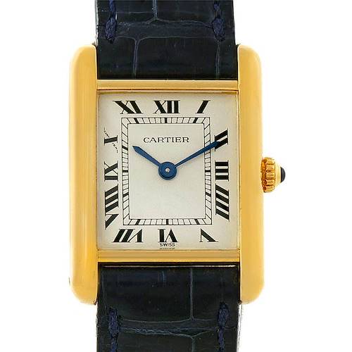 The image shows a front view of the Cartier Tank Classic Women's Yellow Gold Silver Dial Women's Yellow Gold Silver Dial watch, featuring a rectangular dial, Roman numerals, and a leather strap.