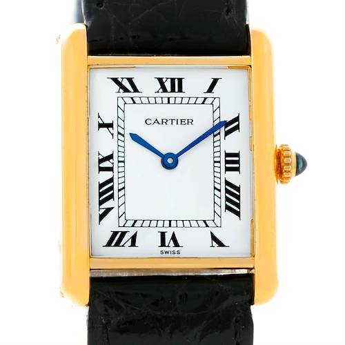This image shows a front view of the Cartier Tank Classic Yellow Gold White Dial Yellow Gold White Dial model watch, highlighting its dial, black strap, and gold-tone case.