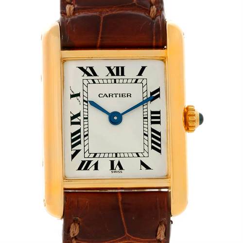 The image shows the face, bezel, crown, and part of the leather strap of a Cartier Tank Classic Women's Yellow Gold Silver Dial Women's Yellow Gold Silver Dial watch.