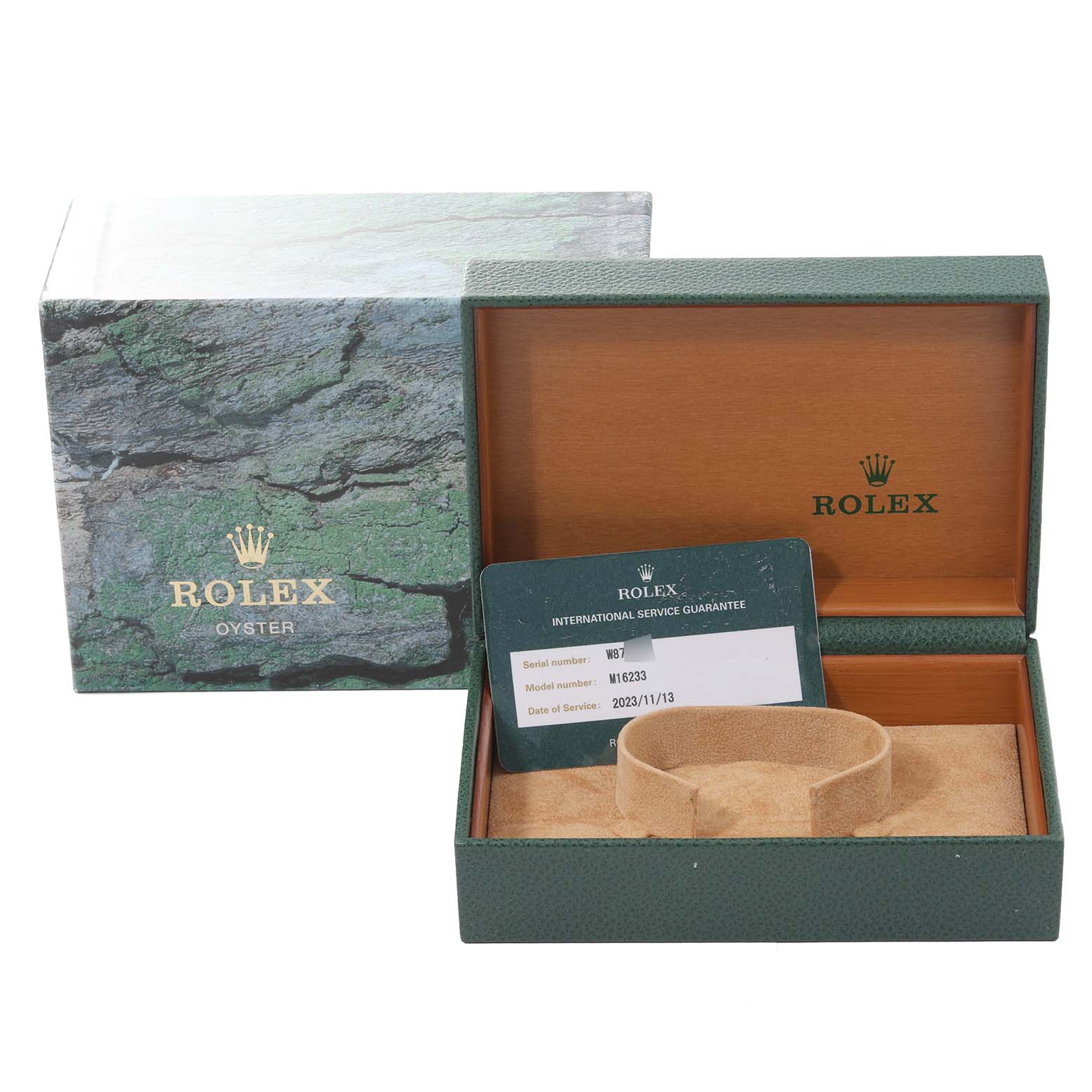 The image shows a Rolex Datejust 16233 Men's Steel and Gold (two tone) Champagne Dial 16233 Men's Steel and Gold (two tone) Champagne Dial watch box, an international service guarantee card, and the cushion holder from a front angle.