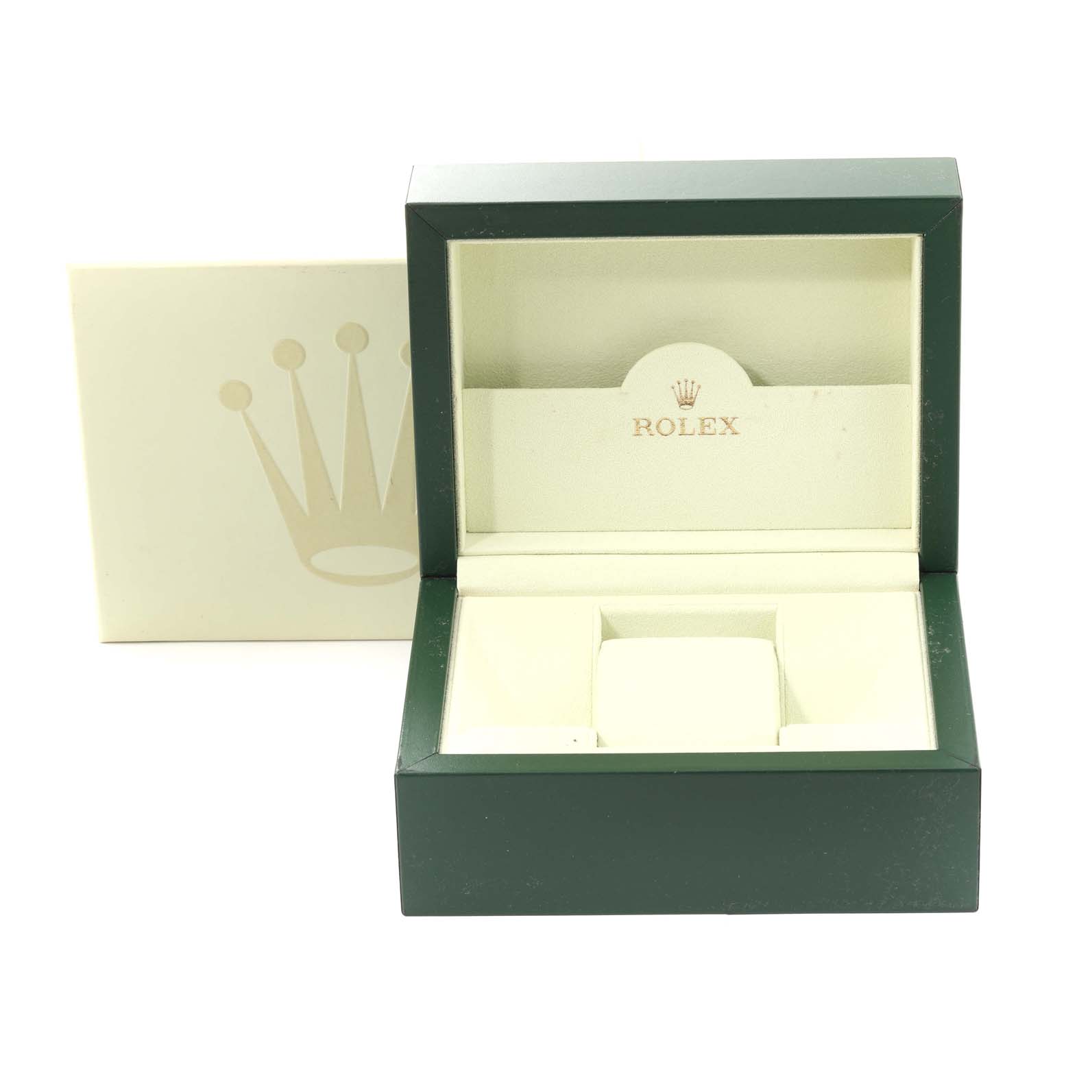 The image shows the open green and beige box for a Datejust model by Rolex, with the crown logo visible inside the lid.