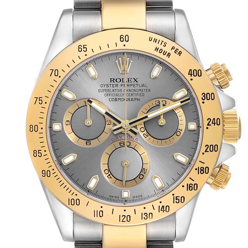 The Rolex Daytona model 116523 men's watch is shown from a frontal angle, highlighting the dial, bezel, and chronograph features.