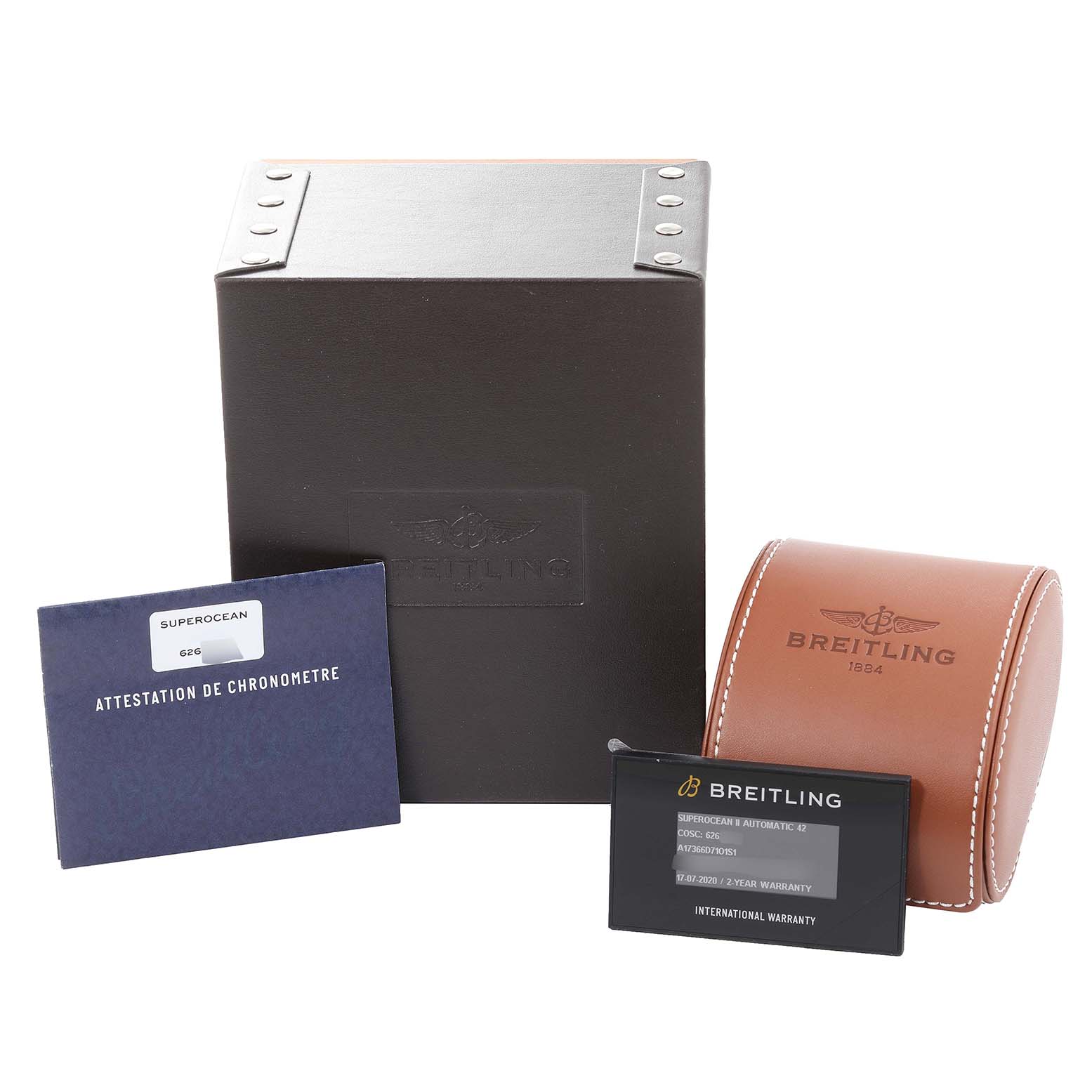The image shows the box, warranty card, manual, and a brown case for the Breitling Superocean A17366 Men's Stainless Steel Orange Dial A17366 Men's Stainless Steel Orange Dial watch.