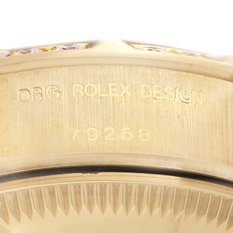 The close-up image shows the side of a Rolex President 79258 Women's Yellow Gold Mother of Pearl Dial 79258 Women's Yellow Gold Mother of Pearl Dial model watch, highlighting the engraved text "ORG. ROLEX DESIGN" and the model number.