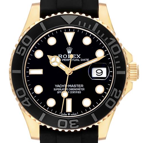 The Rolex Yacht-Master model 226658 is shown from a front angle, highlighting its black dial, gold accents, date window, and black bezel.