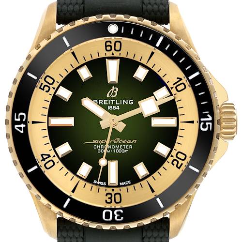This image shows a Breitling Superocean N17375 Men's Yellow Gold Green Dial N17375 Men's Yellow Gold Green Dial watch from a front angle, highlighting the green dial, bezel, and part of the black strap.