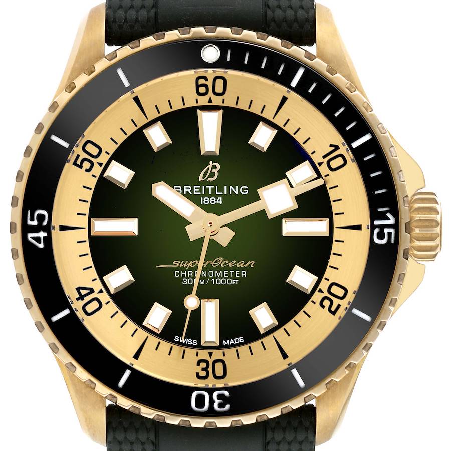 This Breitling Superocean N17375 Men's Yellow Gold Green Dial N17375 Men's Yellow Gold Green Dial watch is shown from a top-down angle, highlighting the dial, bezel, hands, and part of the strap.