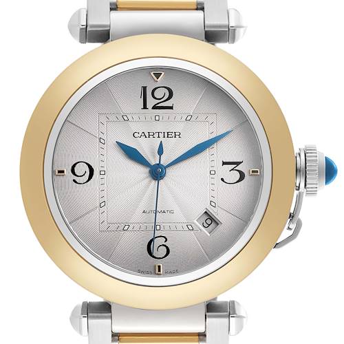 The Cartier Pasha model W2PA0009 men's watch is shown from the front, highlighting its gold bezel, silver dial with blue hands, and distinctive crown.