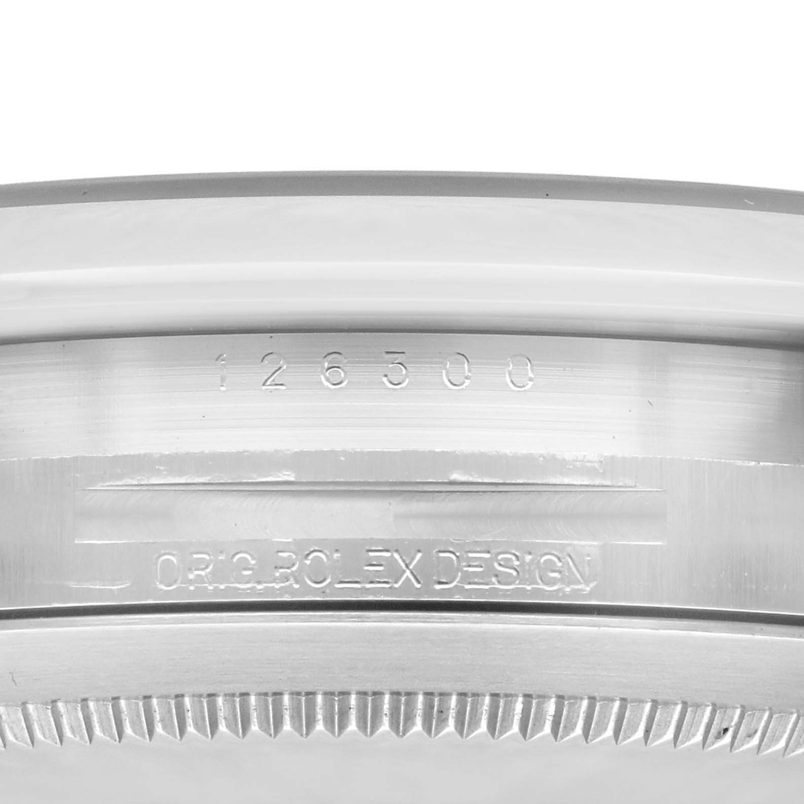 This image shows a close-up of the side engraving on the case of a Rolex Datejust 41 126300 Men's Stainless Steel Silver Dial 126300 Men's Stainless Steel Silver Dial model.