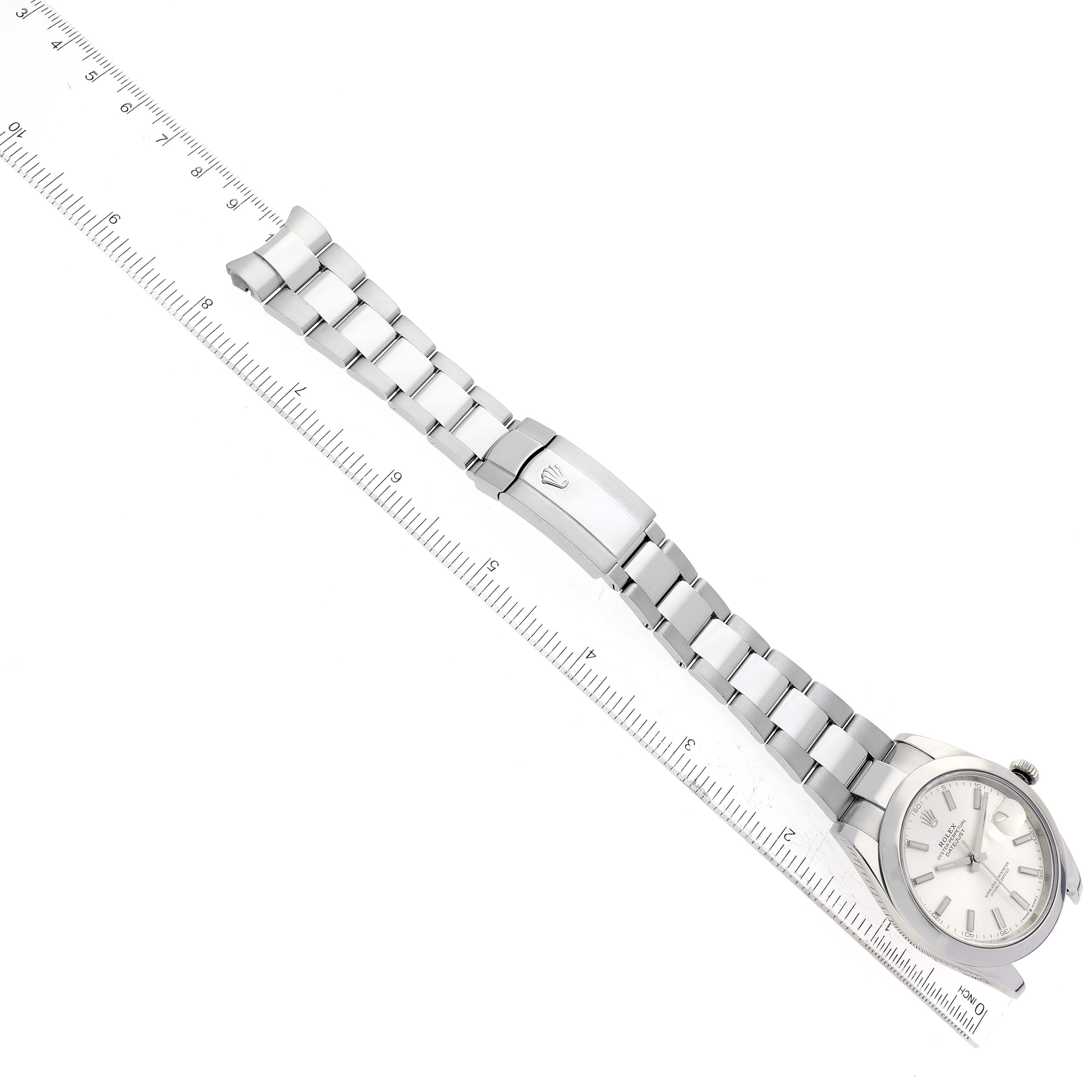 The image shows a Rolex Datejust 41 126300 Men's Stainless Steel Silver Dial 126300 Men's Stainless Steel Silver Dial watch, displayed diagonally and including the bezel, dial, bracelet, and clasp alongside a ruler for size reference.