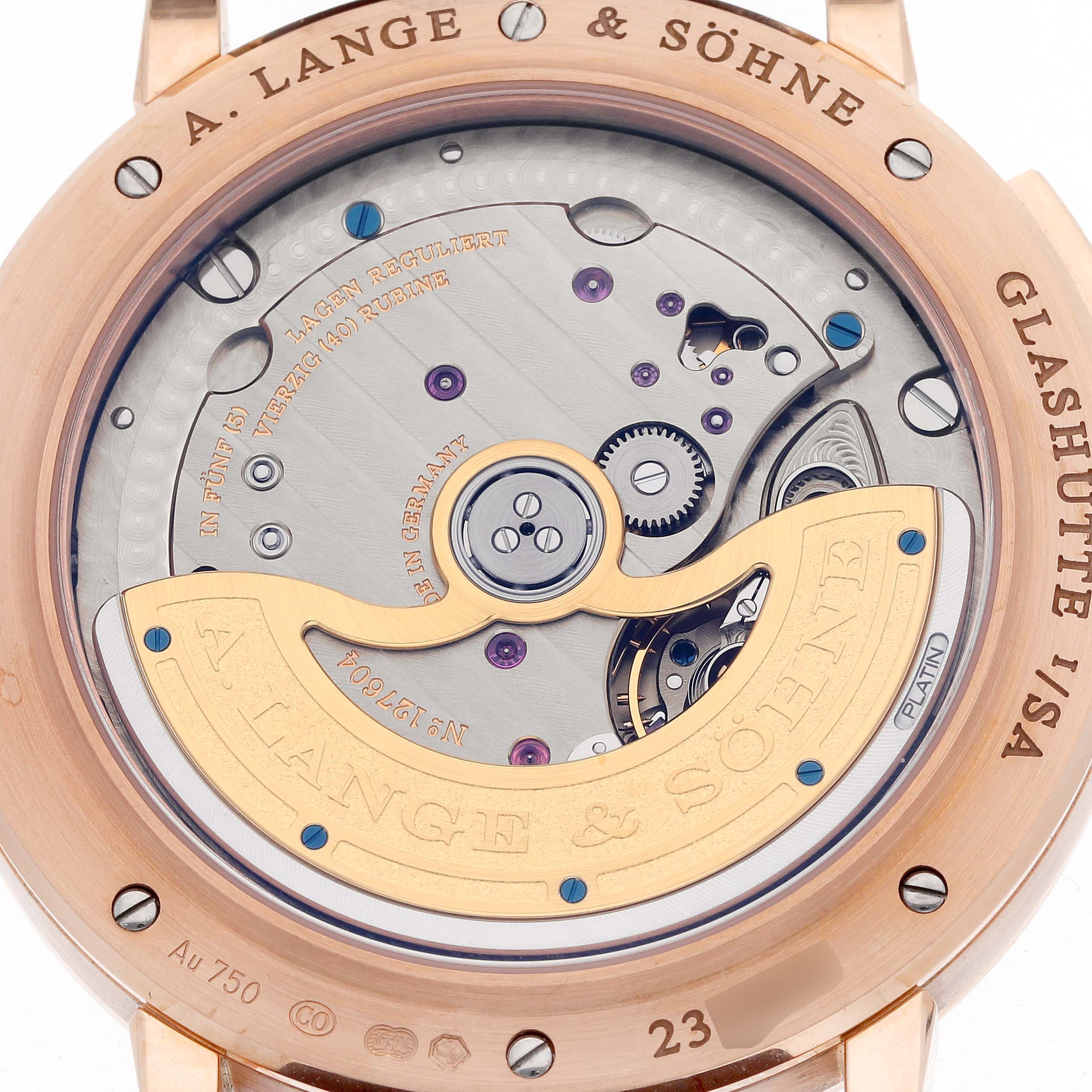 The image shows the case back of the A. Lange & Sohne Saxonia 384.032 Men's Rose Gold Silver Dial watch, revealing its intricate movement and rotor.