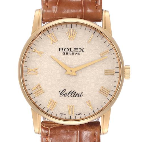 The Rolex Cellini 5116 Men's Yellow Gold Beige Dial watch is shown from the front, displaying its dial, hour markers, hands, and part of the leather strap.