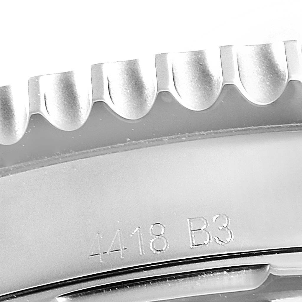 The image shows a close-up of the case side and bezel of a Breitling Navitimer AB0120 Men's Stainless Steel Silver Dial AB0120 Men's Stainless Steel Silver Dial watch.