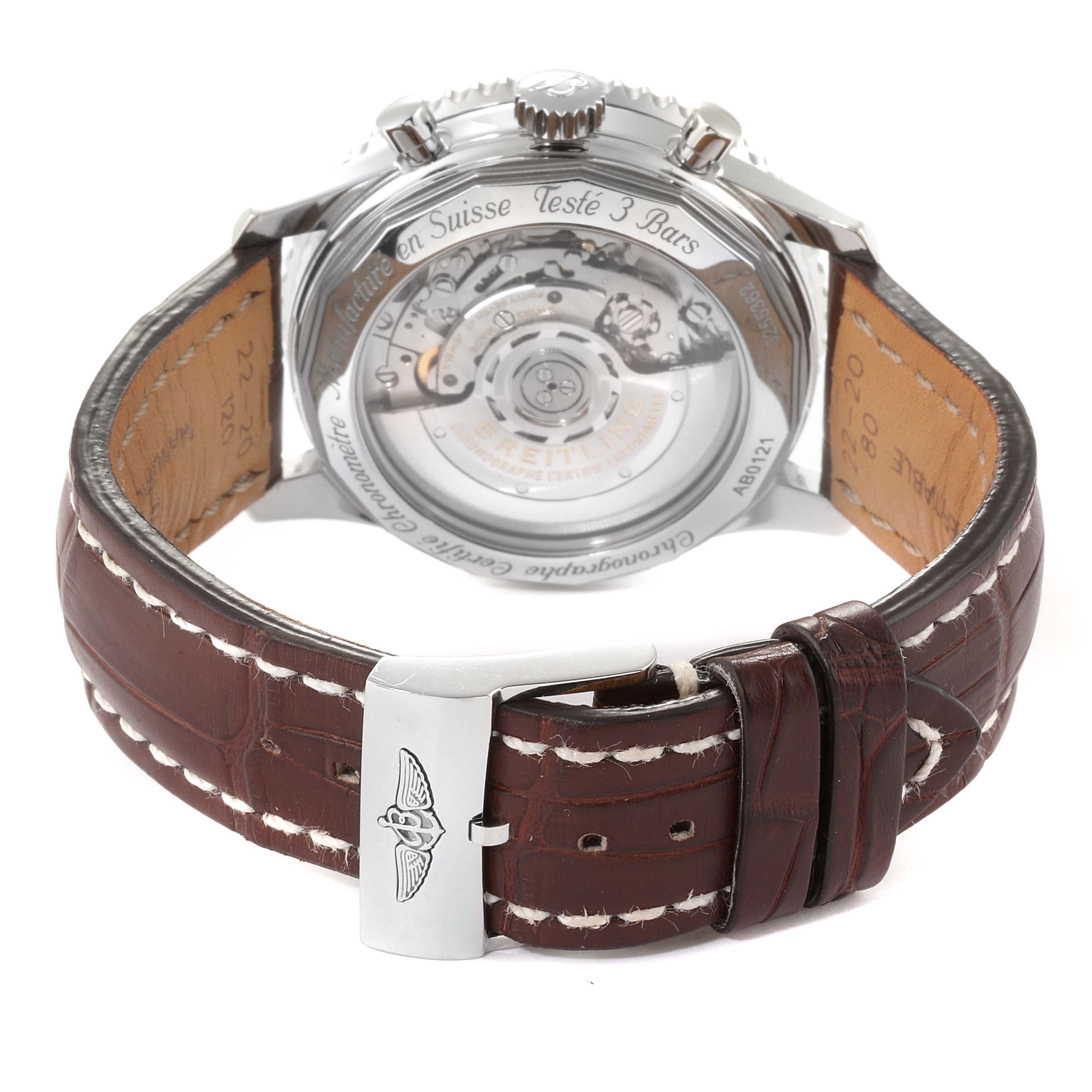 The image shows the back view of a Breitling Navitimer AB0120 Men's Stainless Steel Silver Dial AB0120 Men's Stainless Steel Silver Dial watch, highlighting its leather strap and transparent case back.