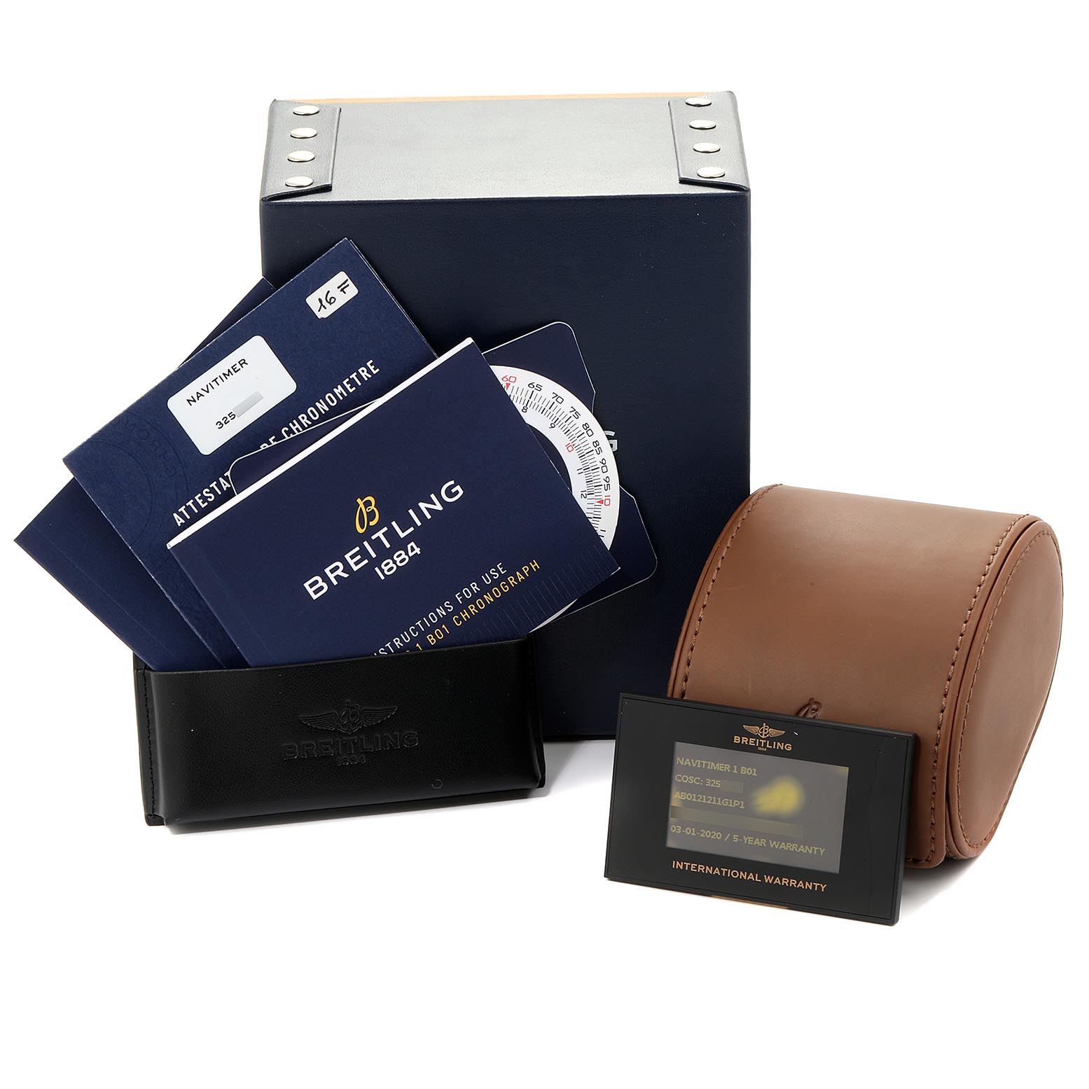 This image shows accessories for the Breitling Navitimer AB0120 Men's Stainless Steel Silver Dial AB0120 Men's Stainless Steel Silver Dial model, including manuals, a leather case, warranty card, and a blue box.