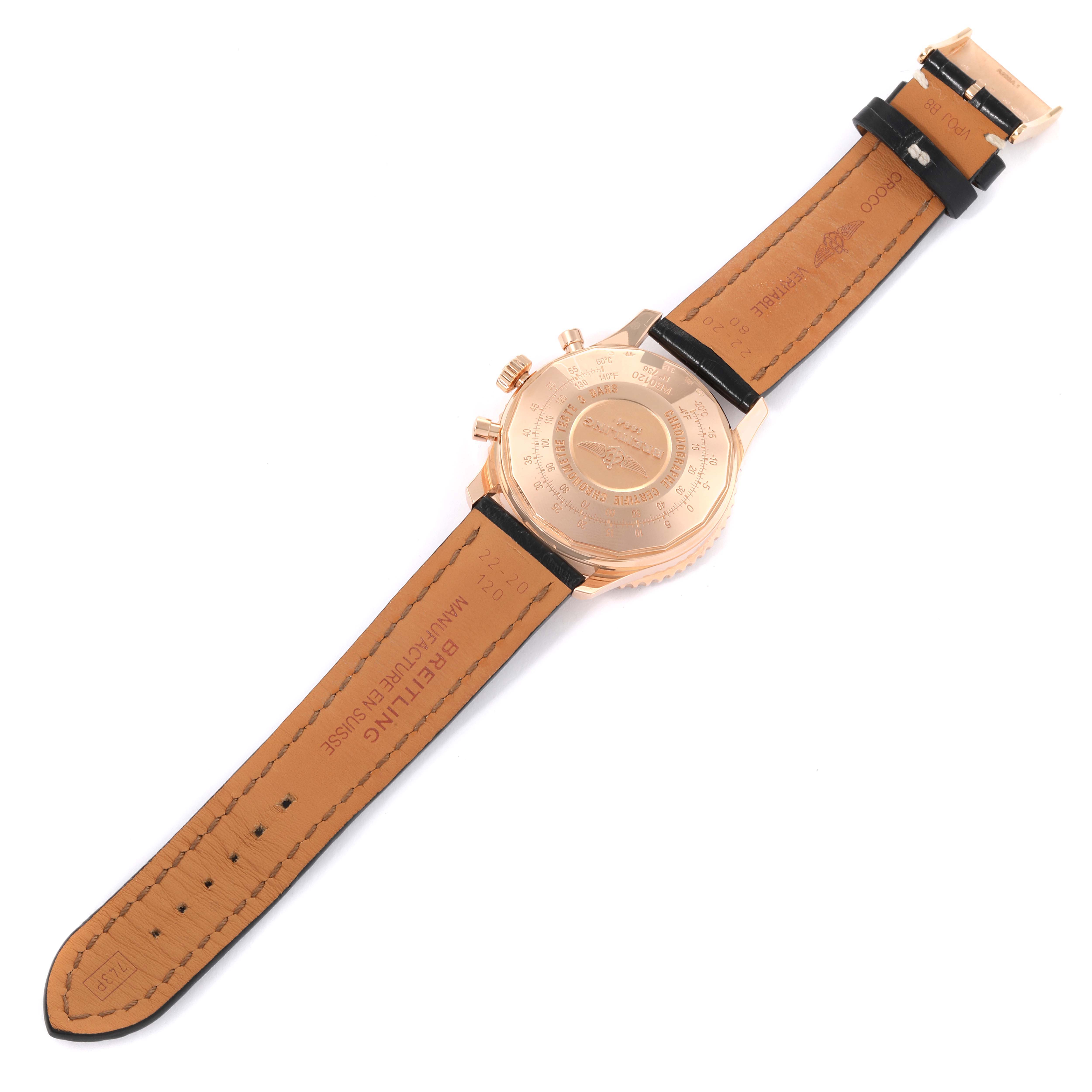 The image shows the backside and leather strap of a Breitling Navitimer RB0120 Men's Rose Gold Black Dial RB0120 Men's Rose Gold Black Dial watch, lying flat with its clasp and case back visible.