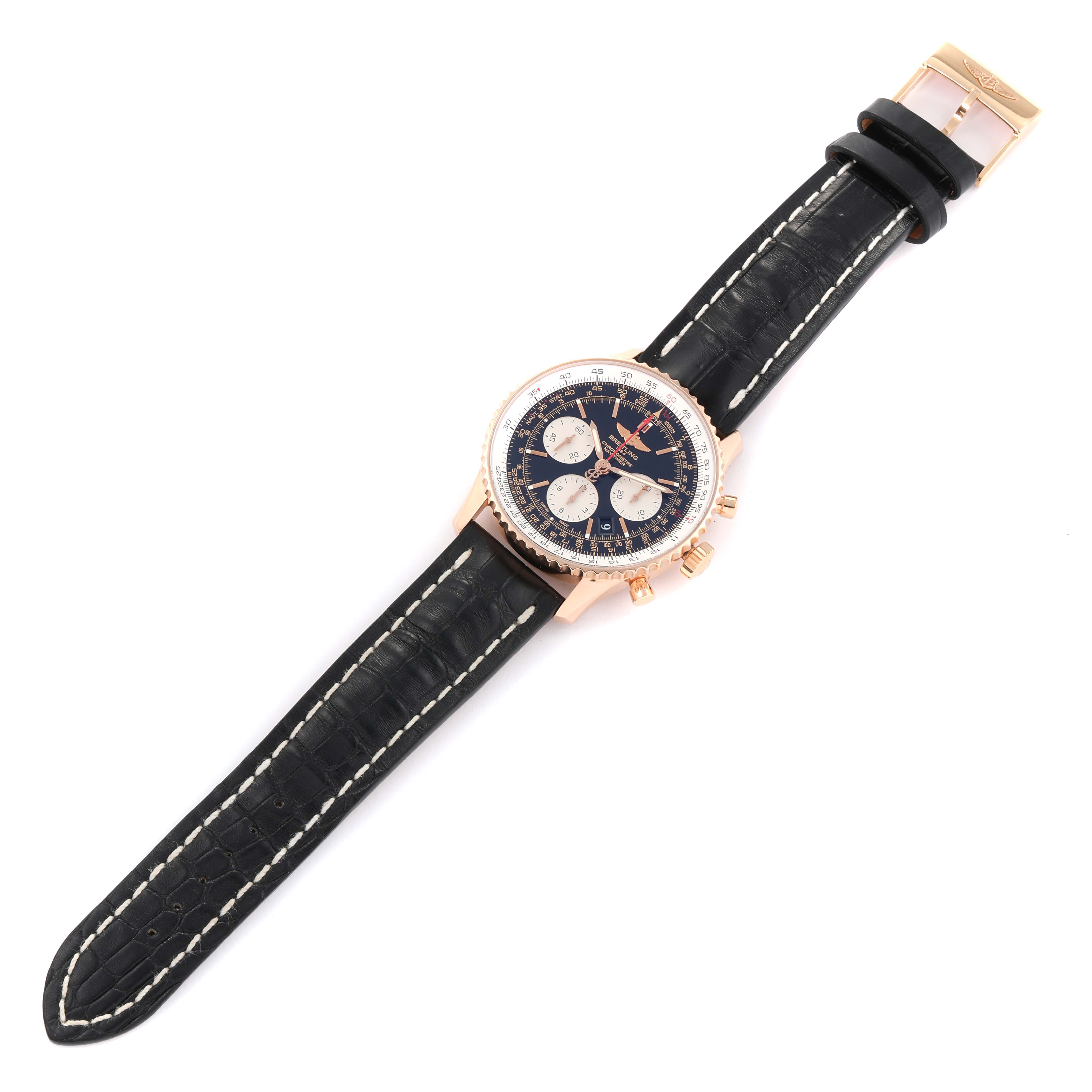 The image shows a top-down view of a Breitling Navitimer RB0120 Men's Rose Gold Black Dial RB0120 Men's Rose Gold Black Dial watch with visible face, strap, and buckle.