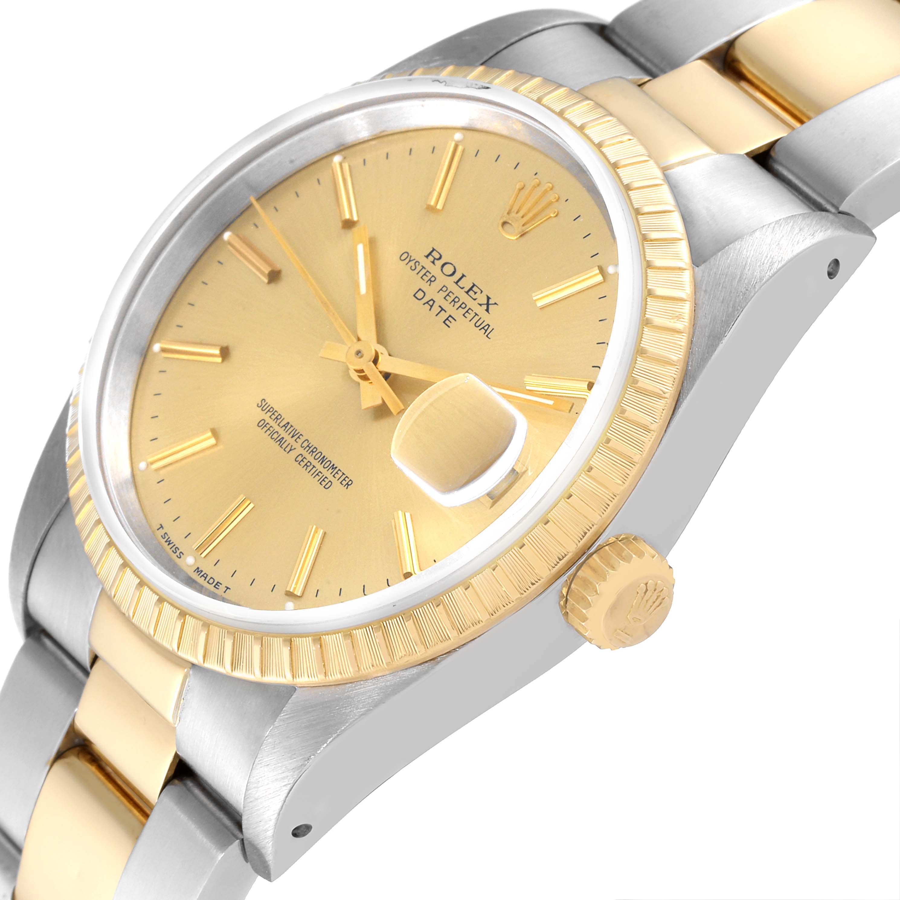 The Rolex Date 15223 Men's Steel and Gold (two tone) Champagne Dial 15223 Men's Steel and Gold (two tone) Champagne Dial model watch is shown at an angled view highlighting its gold dial, crown, and two-tone bracelet.