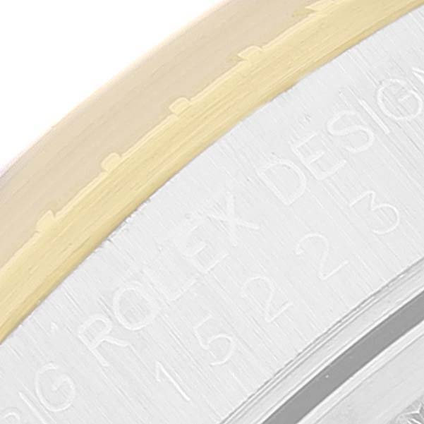 This close-up image of a Rolex Date 15223 Men's Steel and Gold (two tone) Champagne Dial 15223 Men's Steel and Gold (two tone) Champagne Dial model watch shows the case back, including the engraved model number.