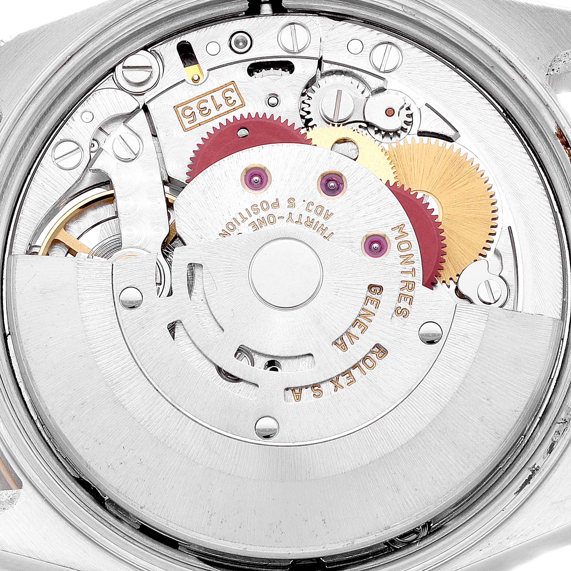 This is a close-up image of the internal automatic movement mechanism of a Rolex Date 15223 Men's Steel and Gold (two tone) Champagne Dial 15223 Men's Steel and Gold (two tone) Champagne Dial model watch.