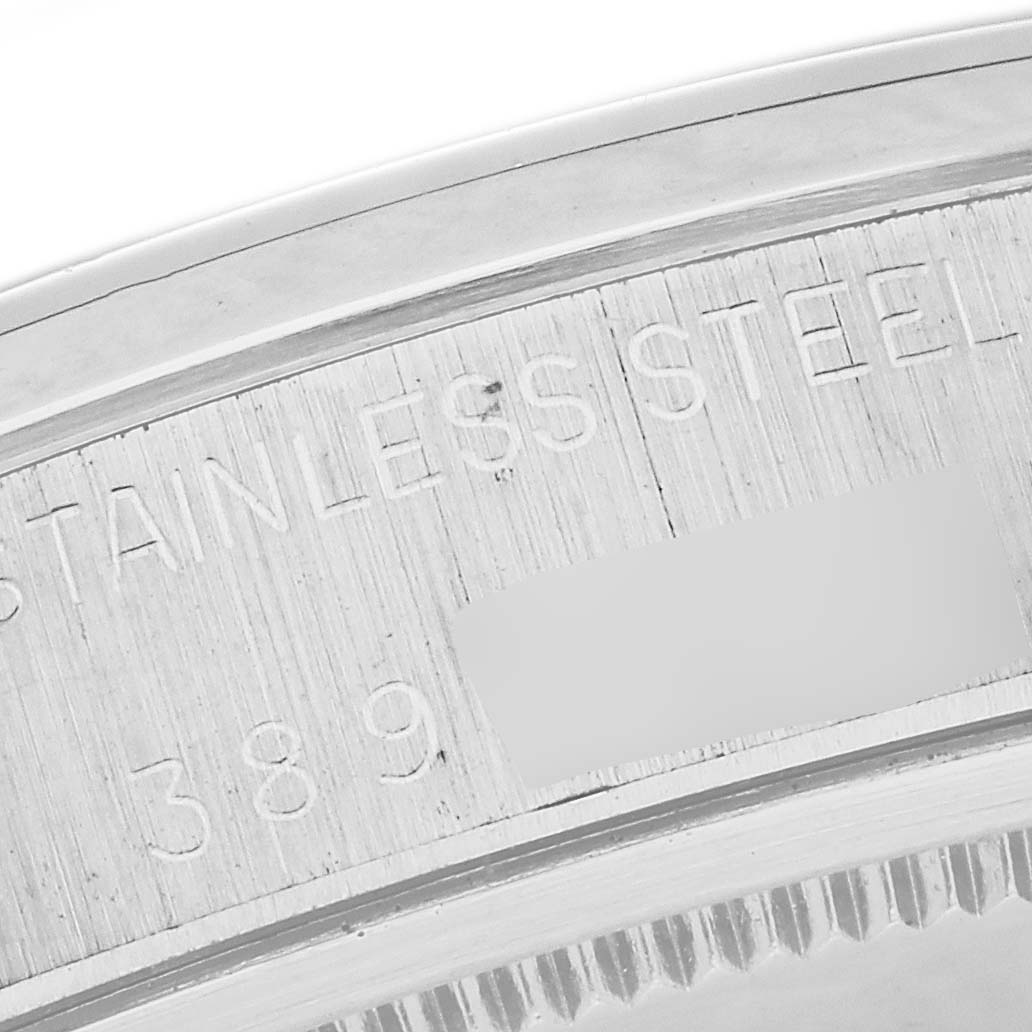 This image shows a close-up view of the case back of the Rolex Vintage Collection 6694 Men's Stainless Steel Champagne Dial 6694 Men's Stainless Steel Champagne Dial watch, highlighting the engraving and materials.