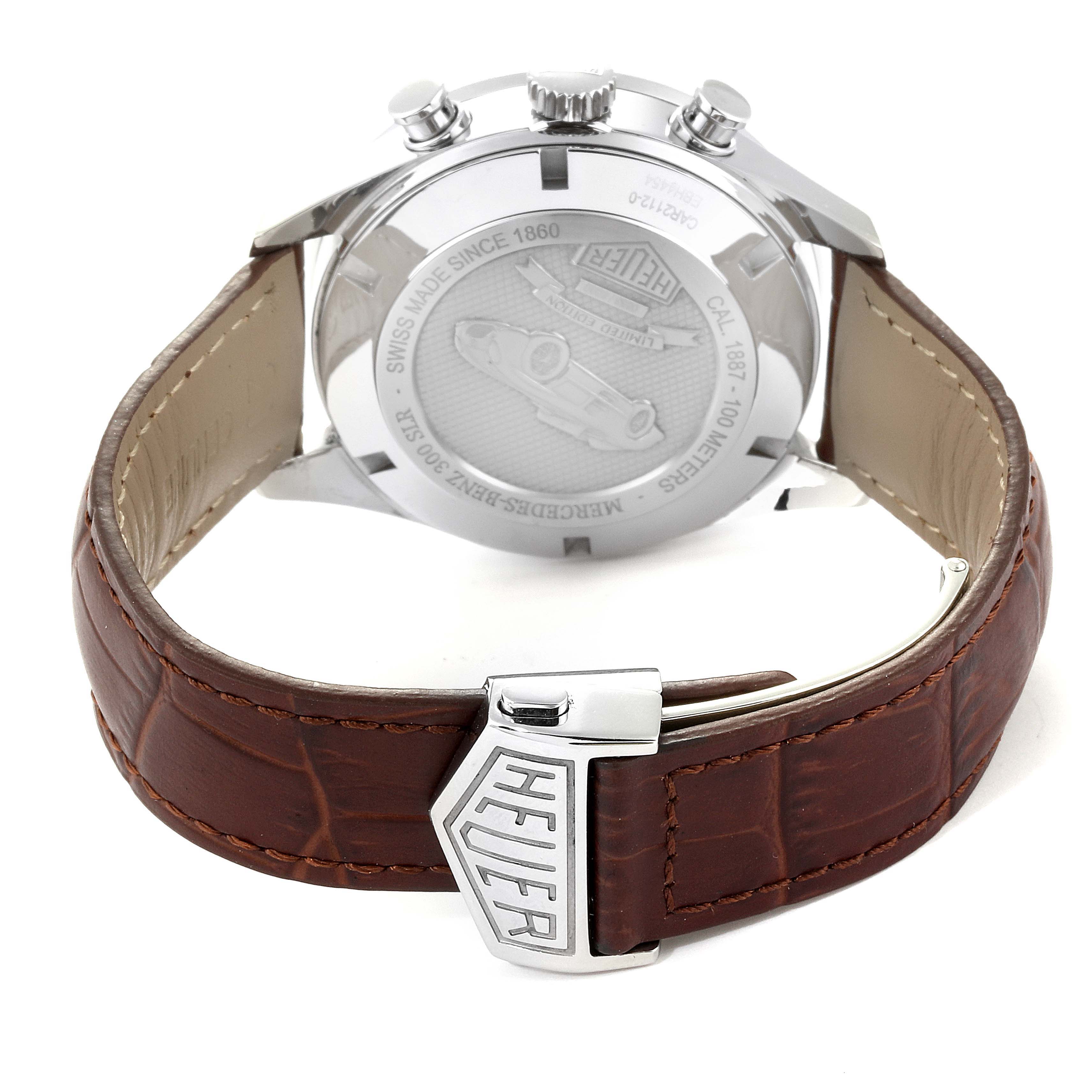 This image shows the back view of a Tag Heuer Carrera CAR2112.FC6267 Men's Stainless Steel Brown Dial CAR2112.FC6267 Men's Stainless Steel Brown Dial watch with its case back and brown leather strap.