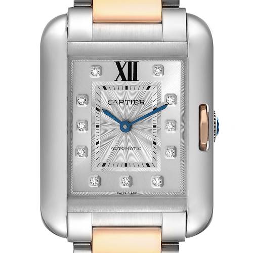 This is a close-up of the Cartier Tank Anglaise WT100025 Women's Steel and Gold (two tone) Silver Dial WT100025 Women's Steel and Gold (two tone) Silver Dial watch, showing the dial, hands, and part of the two-tone bracelet.