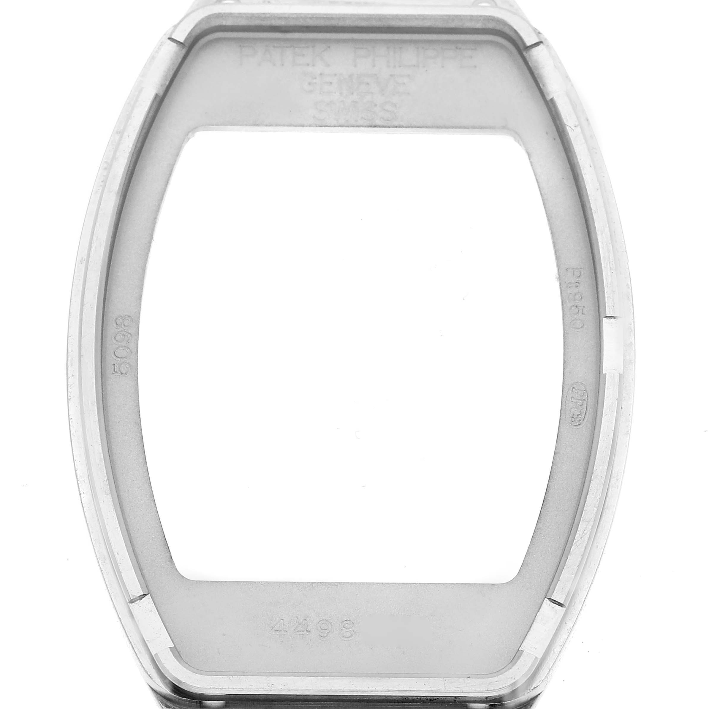 The image shows the casing of a Patek Philippe Gondolo 5098P Men's Platinum Silver Dial 5098P Men's Platinum Silver Dial watch, highlighting its bezel and interior markings.