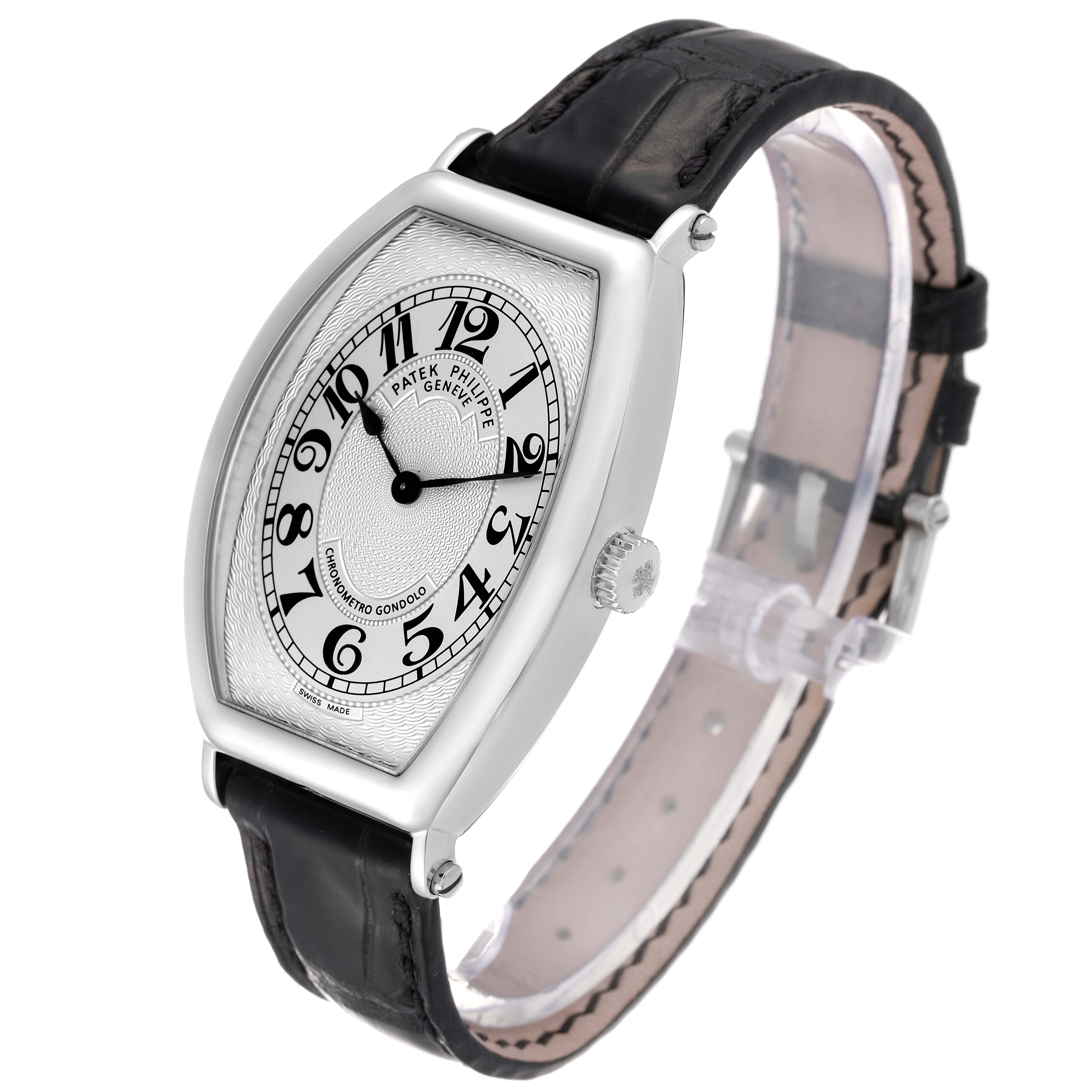The image shows a Patek Philippe Gondolo 5098P Men's Platinum Silver Dial 5098P Men's Platinum Silver Dial watch at a three-quarter angle, displaying its dial, case, crown, and leather strap.