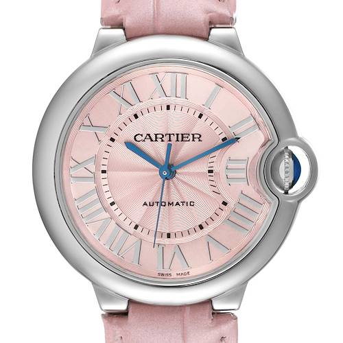 This image shows a close-up of a Cartier Ballon Bleu WSBB0007 Women's Stainless Steel Pink Dial WSBB0007 Women's Stainless Steel Pink Dial watch face, highlighting its pink dial, blue hands, and Roman numerals.