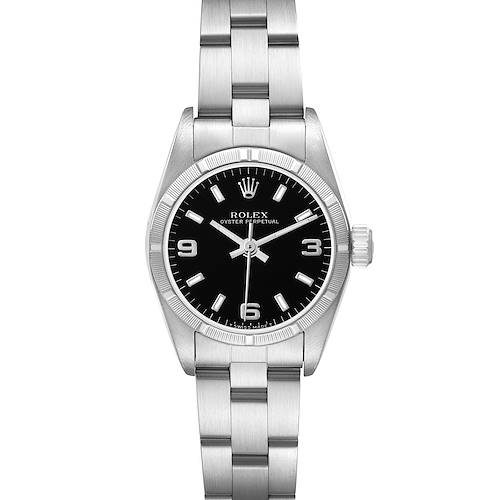 The Rolex Oyster Perpetual 67230 Women's Stainless Steel Black Dial watch is shown from a top-down angle, displaying the face, bezel, and bracelet.