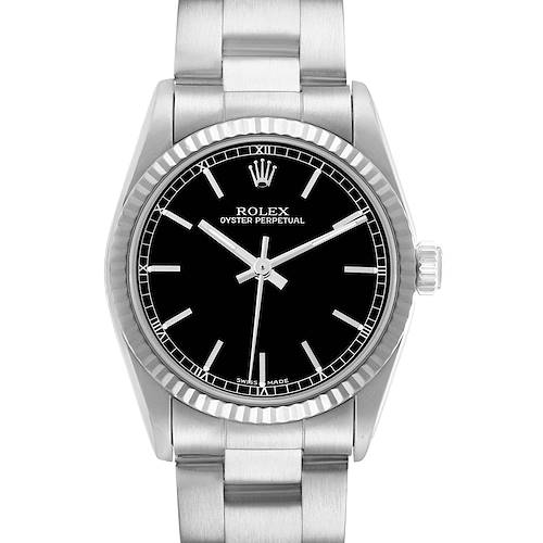 The Rolex Oyster Perpetual 77014 Women's Stainless Steel Black Dial watch is shown from the front, displaying its black dial, silver markers, and metal bracelet.
