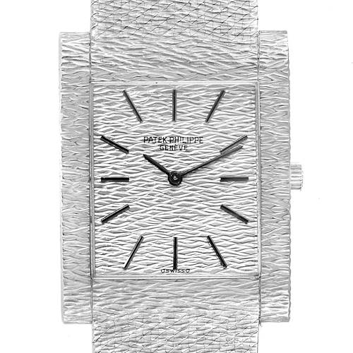 This image shows a close-up of the face and part of the bracelet of a Vintage Patek Philippe watch, featuring a textured design.