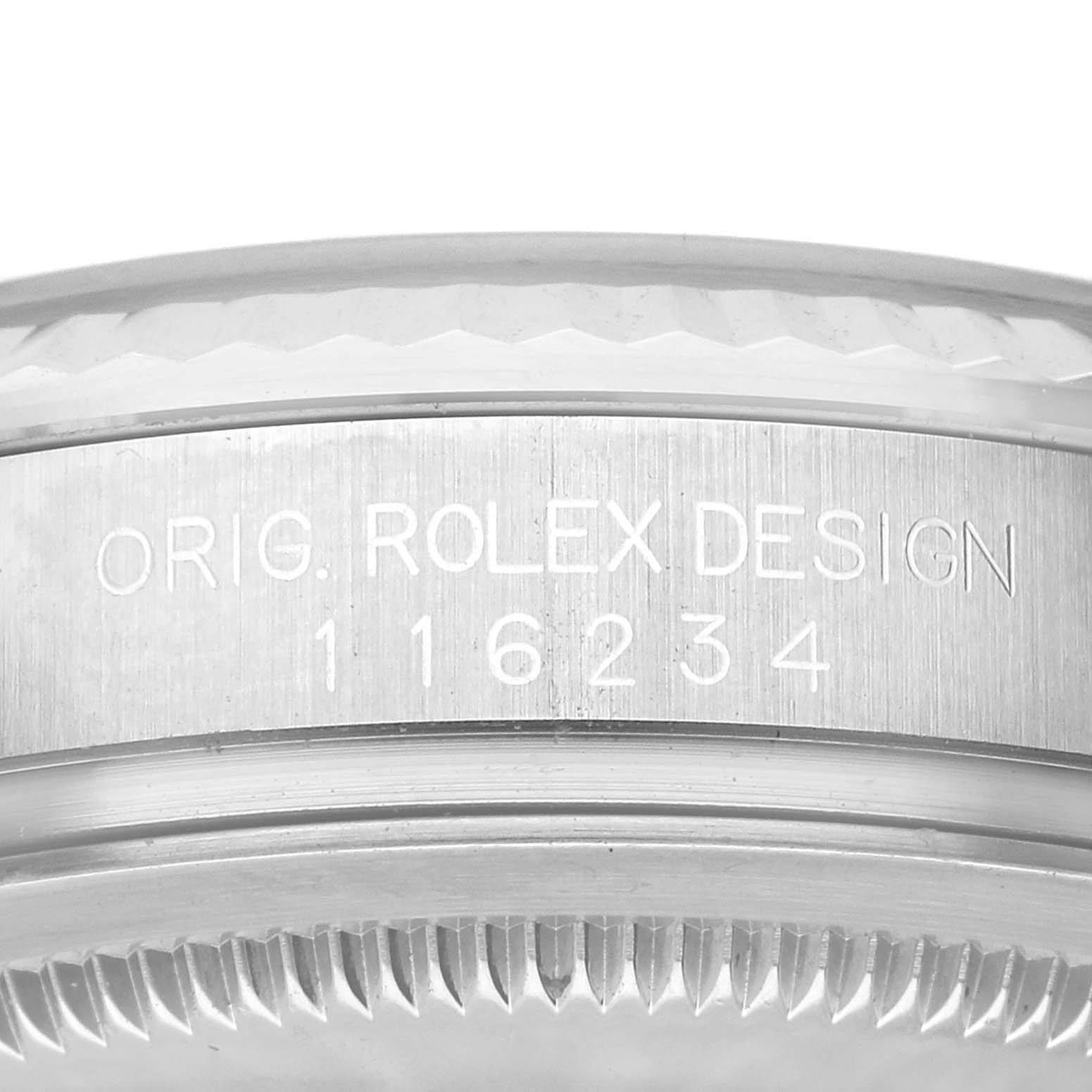 The image shows a close-up of the case side of a Rolex Datejust 116234 Men's Stainless Steel Silver Dial 116234 Men's Stainless Steel Silver Dial watch, highlighting the engraved model number.