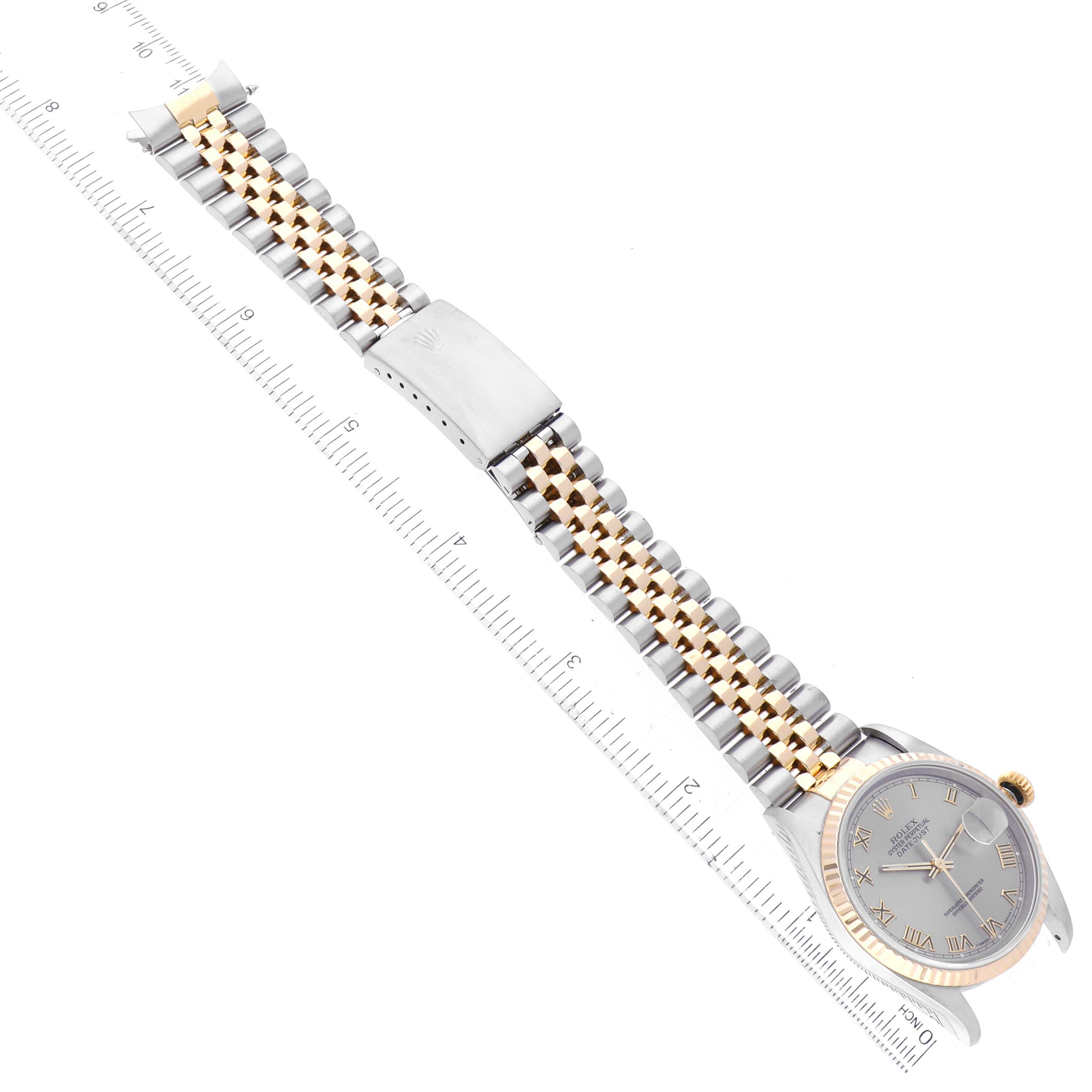 The image shows an overhead view of a Rolex Datejust 16233 Men's Steel and Gold (two tone) Grey Dial 16233 Men's Steel and Gold (two tone) Grey Dial watch, highlighting the face, case, bezel, and two-tone metal bracelet.
