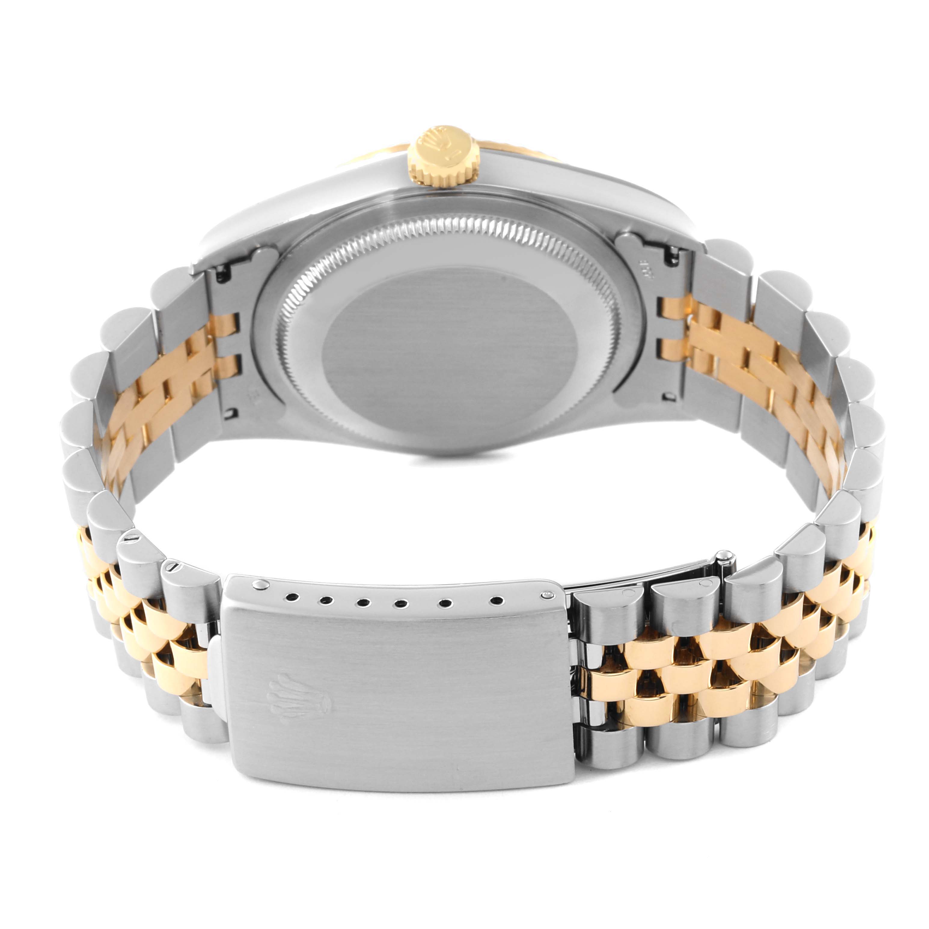The back view of a Rolex Datejust 16233 Men's Steel and Gold (two tone) Grey Dial 16233 Men's Steel and Gold (two tone) Grey Dial watch, showing the two-tone bracelet, clasp, and caseback.