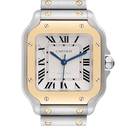 The Cartier Santos W2SA0016 Men's Steel and Gold (two tone) Silver Dial W2SA0016 Men's Steel and Gold (two tone) Silver Dial watch is shown from a front angle, highlighting the dial, bezel, and part of the bracelet.