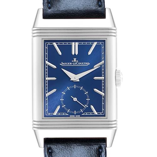 The Jaeger-LeCoultre Reverso watch is shown from a front angle, displaying its blue dial and case with a visible crown.