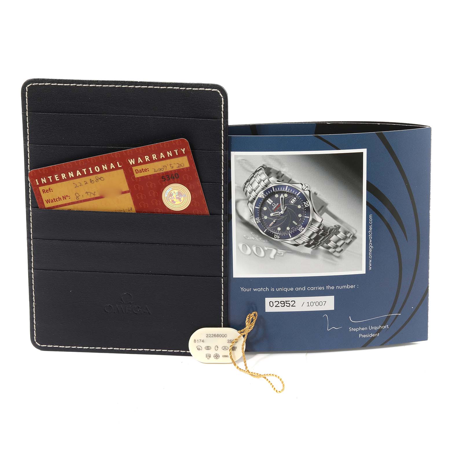 The image shows an Omega Seamaster 2226.80.00 Men's Stainless Steel Blue Dial 2226.80.00 Men's Stainless Steel Blue Dial model warranty card, authentication booklet, and a tag with serial number and model information.