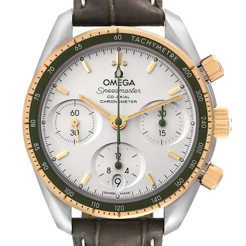 The image shows a frontal close-up view of an Omega Speedmaster 324.23.38.50.02.001 Men's Steel and Gold (two tone) Silver Dial 324.23.38.50.02.001 Men's Steel and Gold (two tone) Silver Dial watch, highlighting its dial, tachymeter bezel, and chronograph sub-dials.