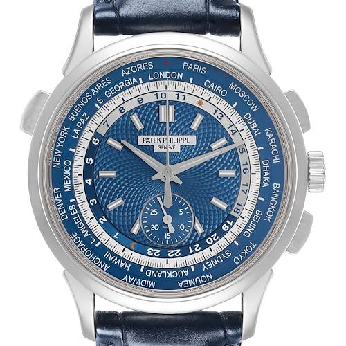 The Patek Philippe Complications 5930G-001 Men's White Gold Blue Dial watch is shown from the front, highlighting its blue dial, world time cities, and leather strap.